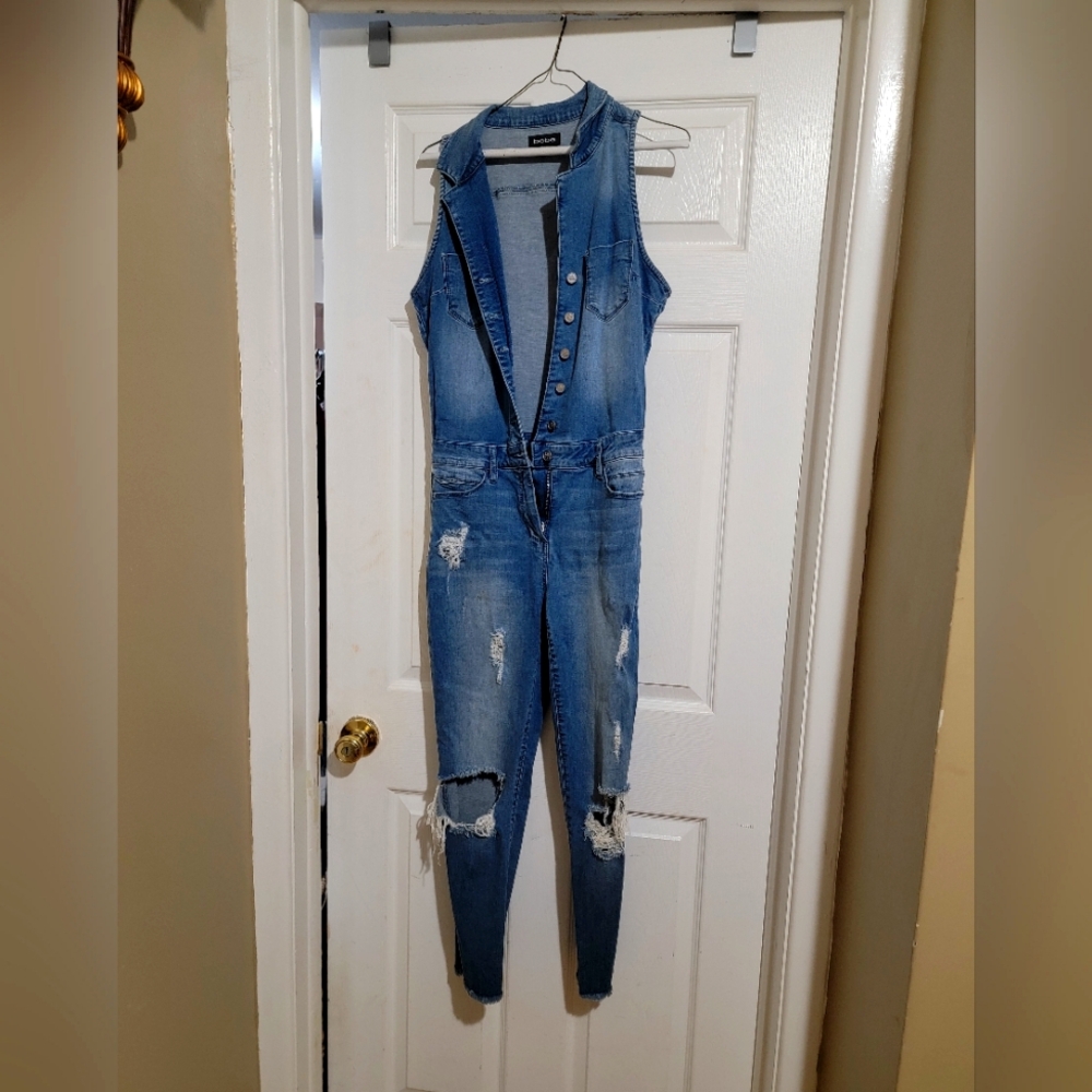 Bebe Distressed ripped jumpsuit